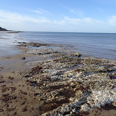 The Lady of the Chalk rises from the sea at West Runton.